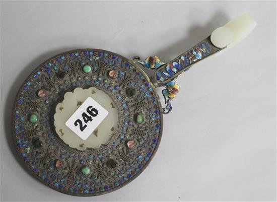 A Chinese enamel and jade coloured hand mirror